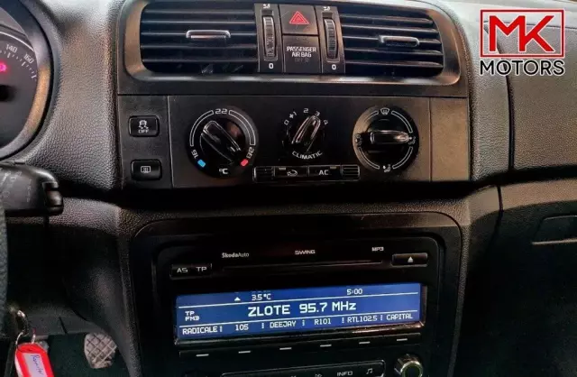 SKODA Roomster 1.2 HTP (70 KM)