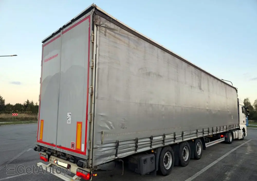 MAN TGX 18.440 + KAESSBOHRER MEGA 