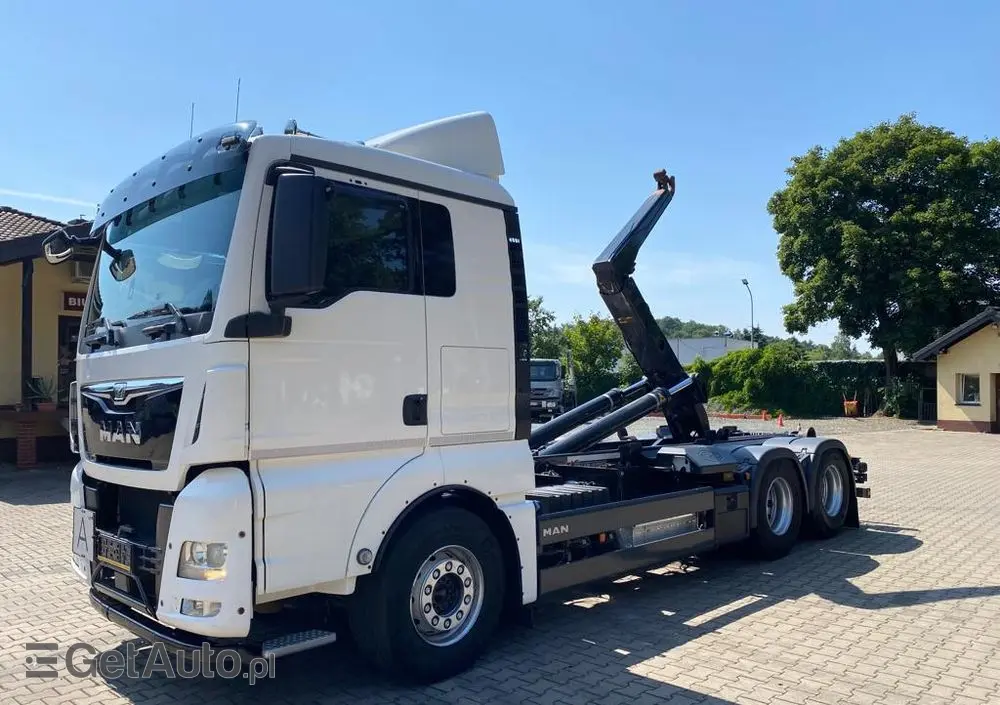 MAN 26.440 TGX hakowiec, 6x2, MEILLER, pilot, 306 t.km. 