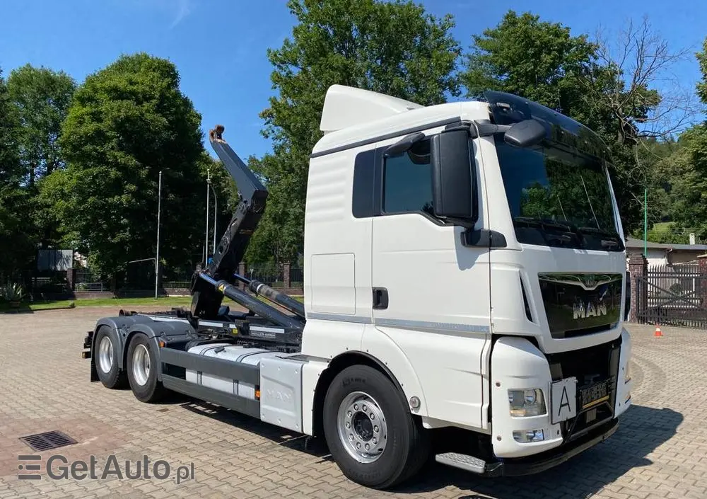 MAN 26.440 TGX hakowiec, 6x2, MEILLER, pilot, 306 t.km. 