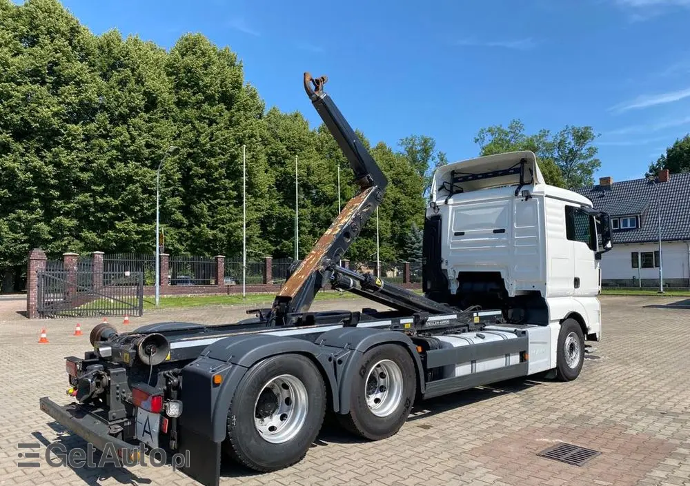 MAN 26.440 TGX hakowiec, 6x2, MEILLER, pilot, 306 t.km. 