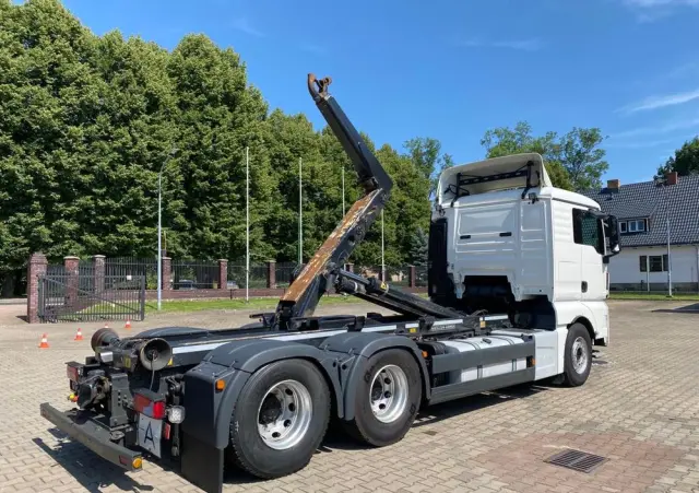 MAN 26.440 TGX hakowiec, 6x2, MEILLER, pilot, 306 t.km. 