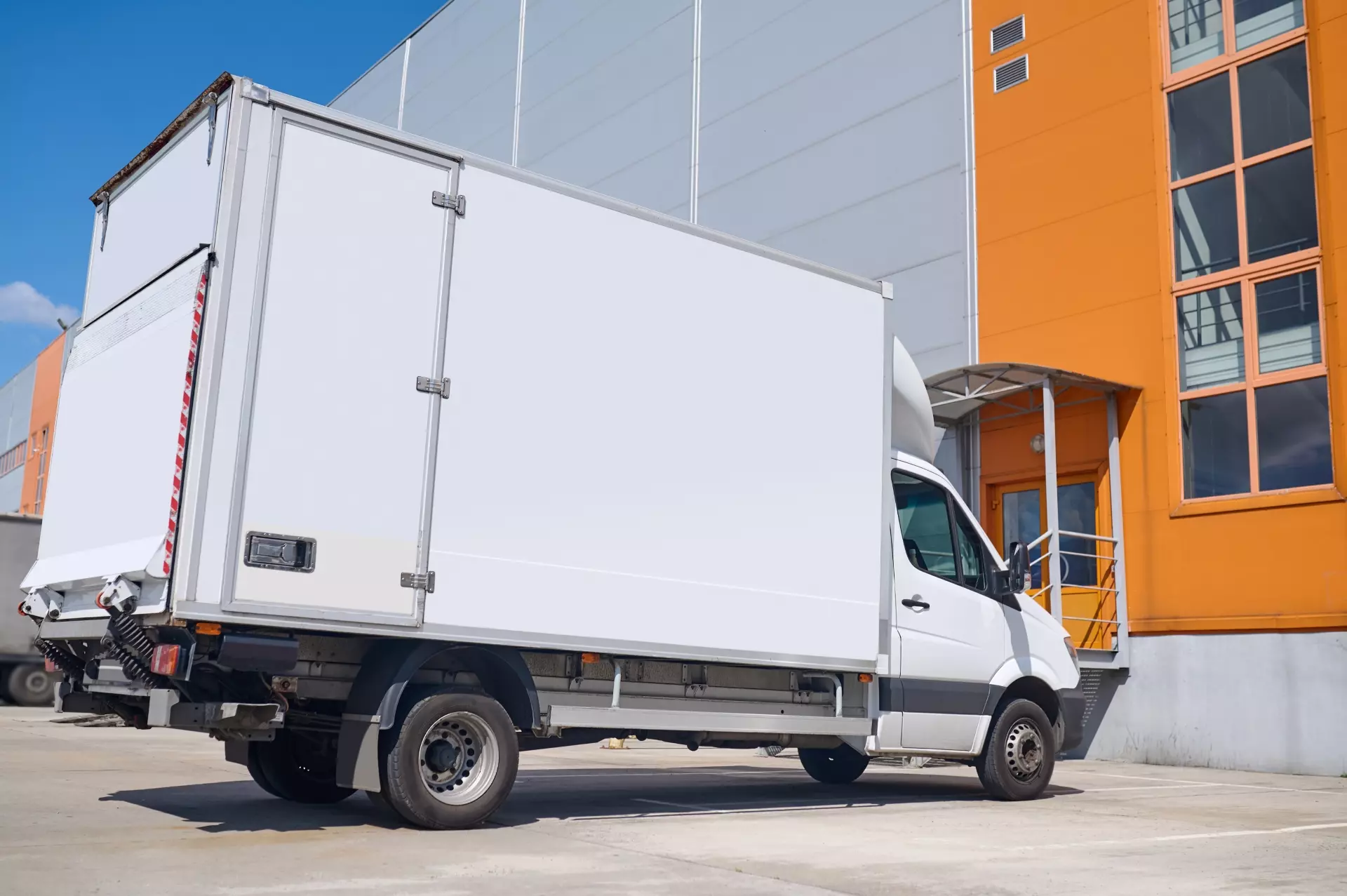 lorry-standing-outdoors-near-warehouse (1)