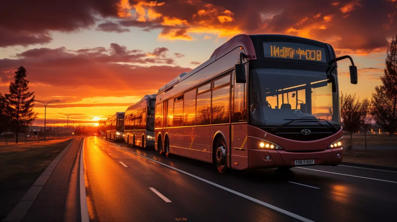 group-buses-driving-along-road-sunset (1)